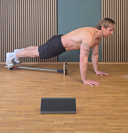 Liegestützgriff und Heimtrainer für Bauchübungen, Klimmzug, Ausfallschritt und Kniebeuge. Klimmzugstange